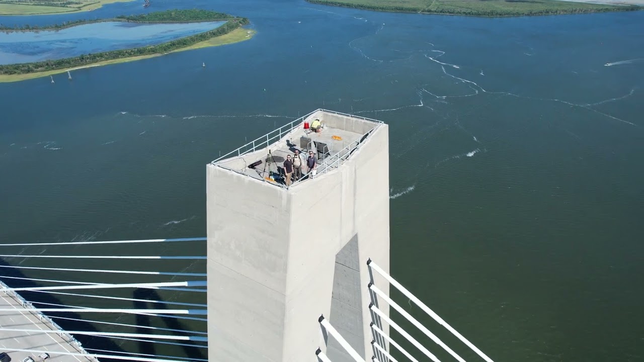 TMG setting up drone sensors on top of the Charleston Bridge prior to the bridge run event.